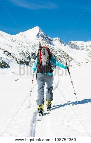 Ski touring in sunny weather.