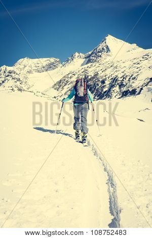 Ski touring in sunny weather.