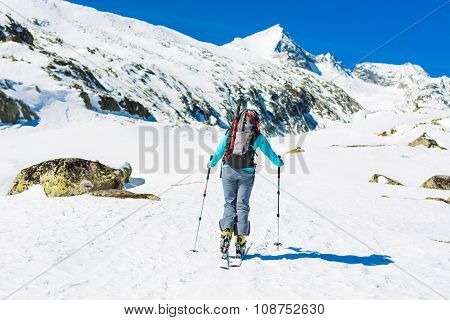 Ski touring in sunny weather.