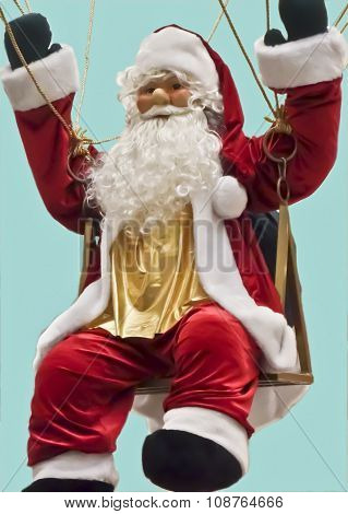 Santa Claus  Down To Earth On A Parachute