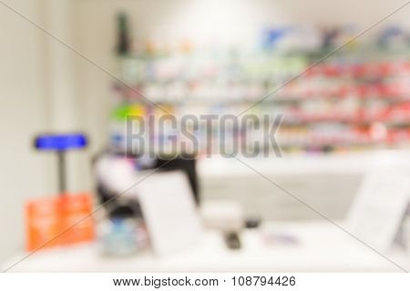 medicine, pharmacy, health care and pharmacology concept - pharmacy or drugstore room blurred background
