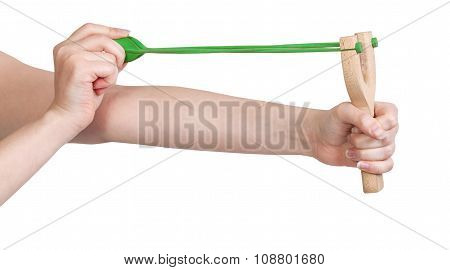 Hands Pull Rubber Band Of Slingshot Isolated