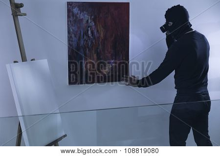 Art Thief With Flashlight