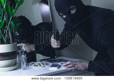 Masked Intruder With Gun