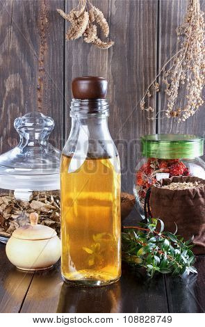Therapeutic Herbal Tincture, Alternative Medicine, Love Potions, Dried Herbs On A Wooden Table.