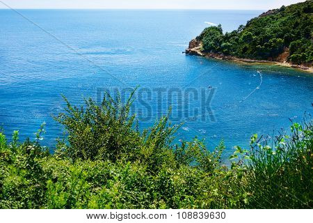 Beautiful bay of Adriatic coast near Budva. Aerial view of Mogren beach