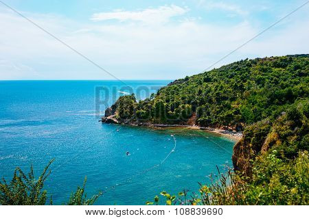 Beautiful bay of Adriatic coast near Budva. Aerial view of Mogren beach