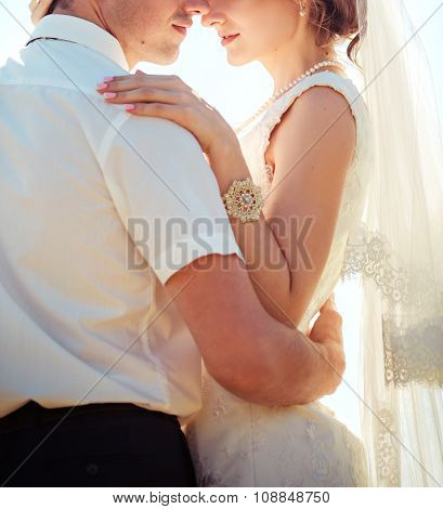 Bride and groom on their wedding day in garden