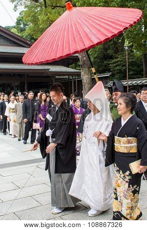 Tokyo, Japan - October 10, 2015: Celebration Of A Typical Shinto Wedding At Meiji Jingu Shrine In To
