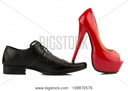 ladies shoe on men's shoe, symbol photo for separation, divorce and conflict
