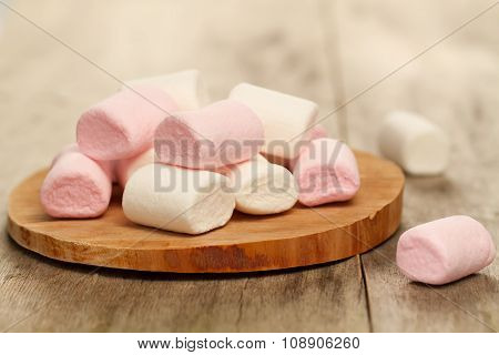 Sweet Colorful Marshmallow On Cutting Board On Wooden Background