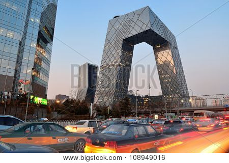BEIJING, CHINA - APR 1: Beijing street view with traffic at night on April 1, 2013 in Beijing, China. It is the second largest Chinese city and the nation's political, cultural, educational center.