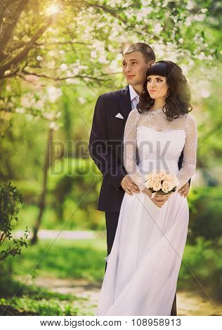 Bride and groom on their wedding day in garden