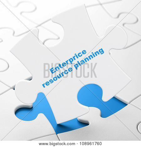 Finance concept: Enterprice Resource Planning on puzzle background