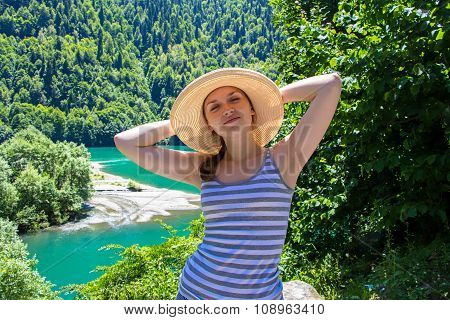 Happy young tourist with panama hat