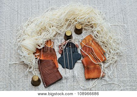 Set for a cobbler to sew moccasins.