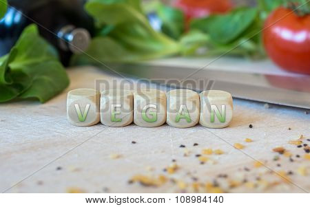 Knife, Salad, Cubes And Spices On A Chopping Board