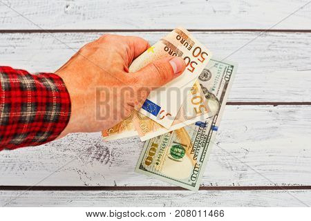 Male Person Exhange Euro To Us Dollars