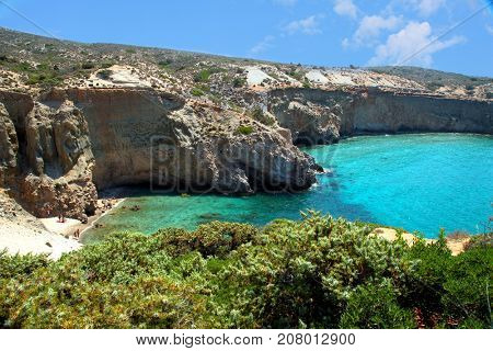 Beautiful turquoise water at Tsigrado beach in Milos island in Greece