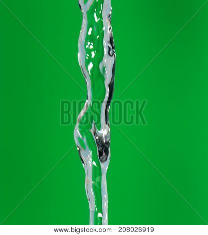 a jet of water on a green background
