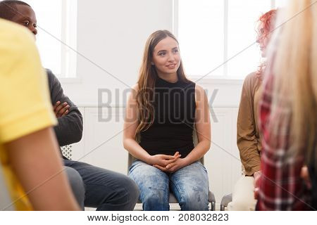 Meeting of support group. Happy woman talking about her life, everything good. Mental health, psychotherapy concept