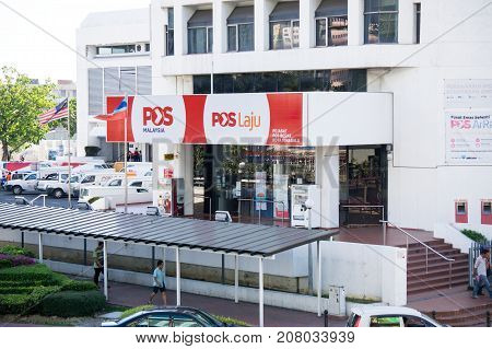 Kota Kinabalu Malaysia - August 01 2017: Front view of Pos Malaysia Berhad office in capital city of Sabah State. Pos Malaysia Berhadis a postal delivery service in Malaysia.