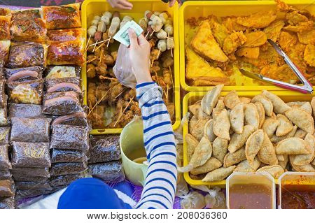 Top View Of Unidentified Stall Vendor Selling Variety Of Malaysian Food, Cakes And Dessert In Kota K