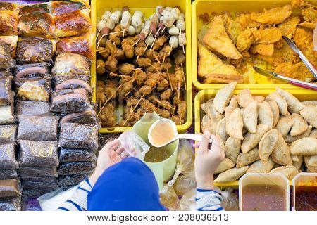 Top View Of Unidentified Stall Vendor Selling Variety Of Malaysian Food, Cakes And Dessert In Kota K