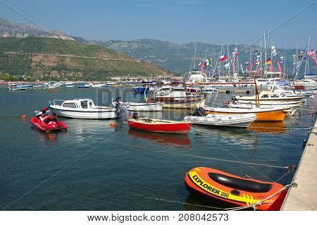 MONTENEGRO, BUDVA - AUGUST 08, 2017: Pier for sailing yachts and boats off the coast of Budva Budva Riviera