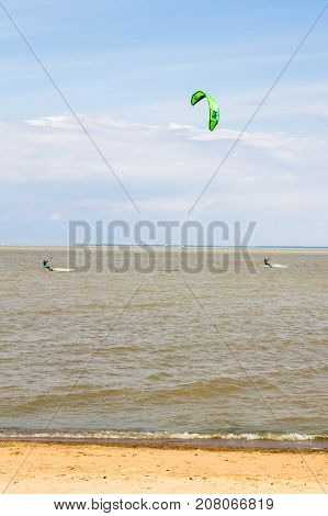 Windsurfing On The Beach Of The Big Izhora Gulf Of Finland