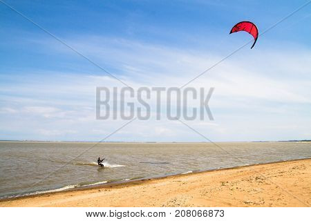 Windsurfing On The Beach Of The Big Izhora Gulf Of Finland