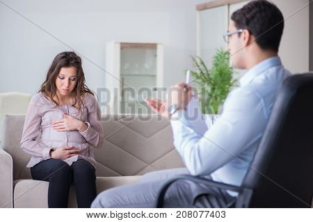 Pregnant woman visiting psychologist doctor