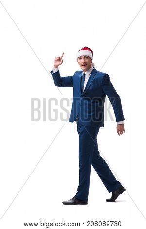 Young busnessman wearing santa hat in christmas concept on white