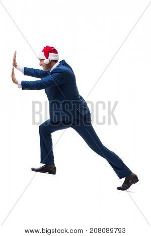 Young busnessman wearing santa hat in christmas concept on white