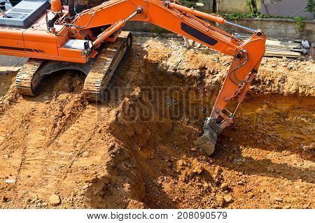 Continuing the work of a bulldozer on site excavation