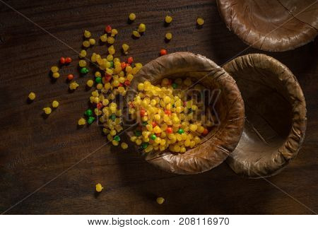 Bundi - a traditional Indian deep fried sweet served in a eco-friendly bowl. View from top.
