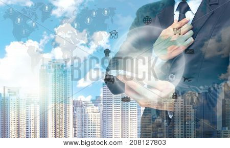 Double exposure of businessman using the tablet for Information technology on world map and cityscape background business conceptElements of this image furnished. 3D illustration