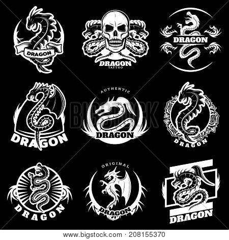 Vintage white dragon tattoo labels set with letterings fantasy reptiles skull flowers on black background isolated vector illustration