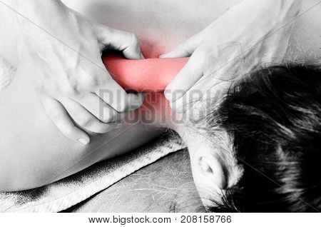 Physiotherapist, Chiropractor Giving A Massage And Stretching Of Subscapularis And Rhomboid To A Pat
