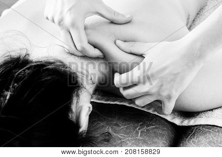 Physiotherapist, Chiropractor Giving A Massage And Stretching Of Subscapularis And Rhomboid To A Pat