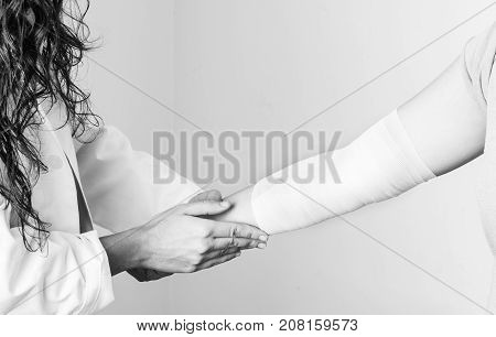 Compression Bandage To Inflammation, Application A Spiral Bandage. Application A Spiral Bandage In S