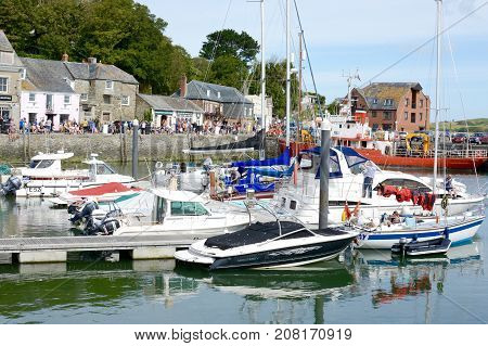 PADSTOW, UK - SEPTEMBER, 2 2017: People of their holidays and enjoying the fishing port and town of Padstow, Cornwall, UK