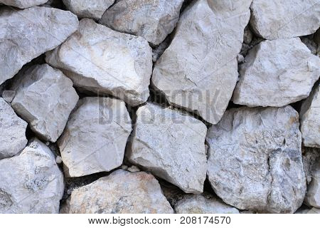 Abstract background of rocky wall texture. Reusable design element, very organic and grungy with a lot of details. Great as backdrop or texture on elements.