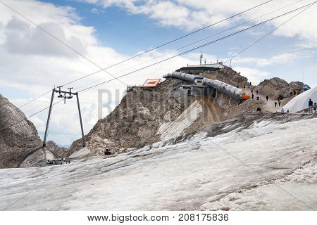 People Hiking Around Dachstein Hunerkogel Mountain Station, Alps, Austria