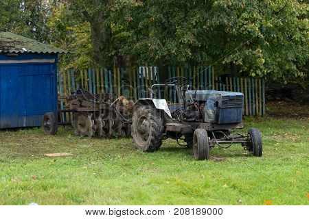 Homemade Village Tractor Parked Outside The Yard