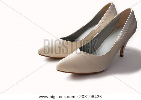 White leather high heels isolated on white background.