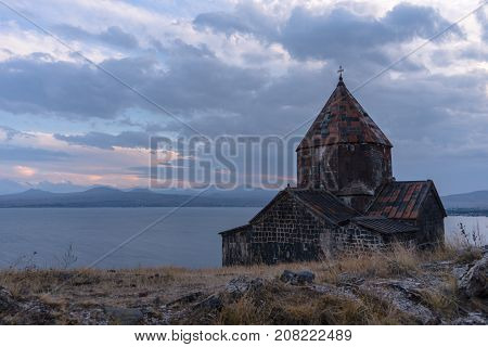 Twilight on Lake Sevan in Armenia and Monastery horizontal
