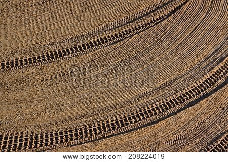 Cleaned by a tractor sand on the Mediterranean beach in the morning. Antibes Cote d'Azur France. Large space for writing