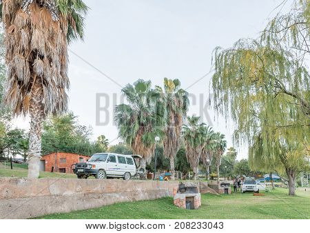 UPINGTON SOUTH AFRICA - JUNE 11 2017: Camping sites at Sakkie se Arkie a holiday resort next to the Orange River at Upington a town in the Northern Cape Province