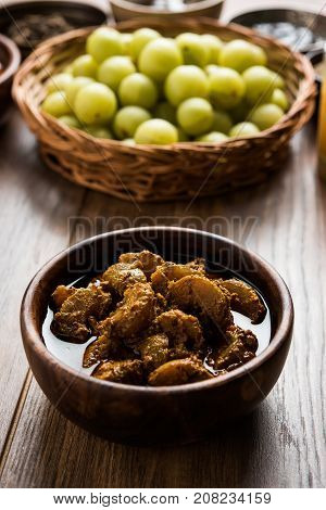 Stock photo of Amla/Avla/Aavla and it's by product called pickle or achar, selective focus